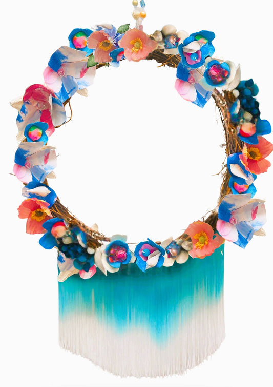 Colorful wreath with flowers on a white background